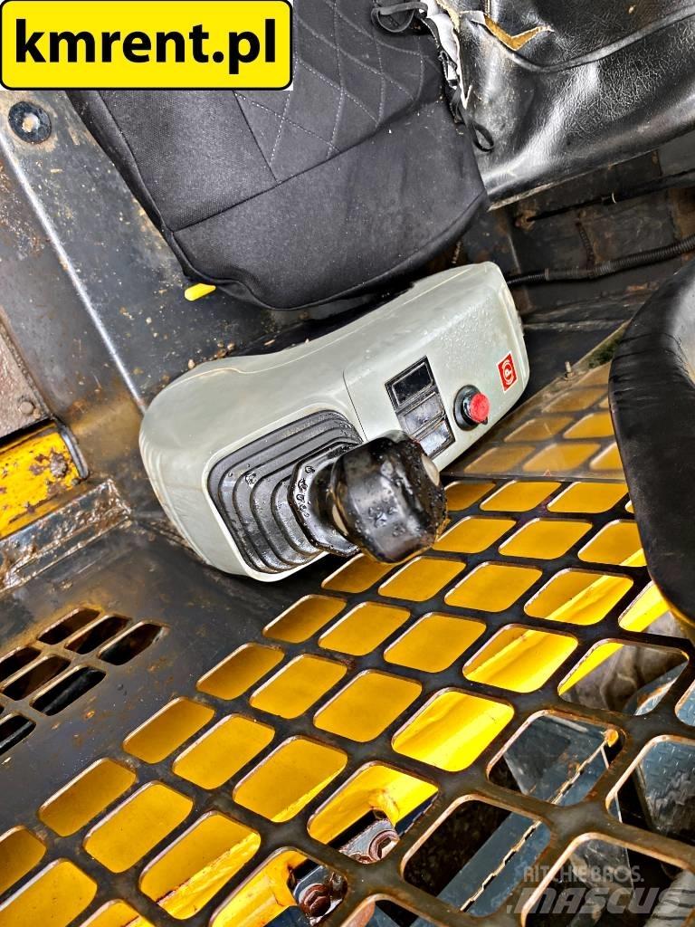 Komatsu SK 815 Skid Steer Loaders