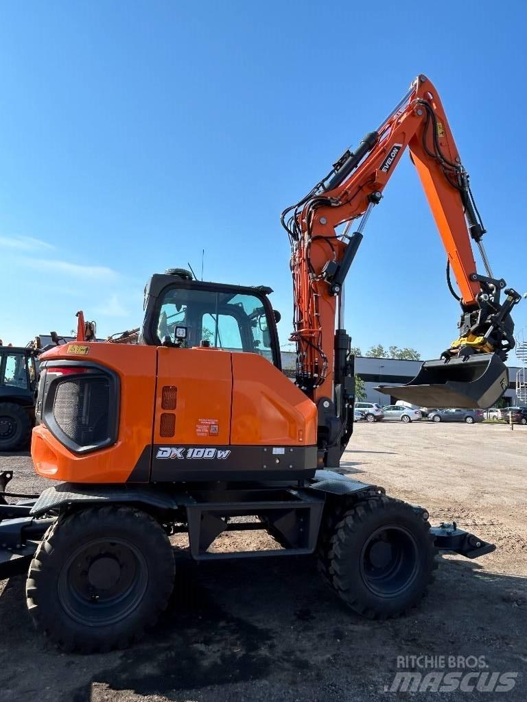 Develon DX 100 W-7 Wheeled Excavators