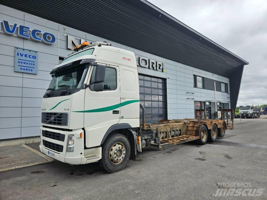 Volvo FH12 8x4 Forest machine transport trucks