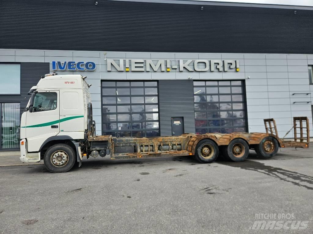 Volvo FH12 8x4 Forest machine transport trucks