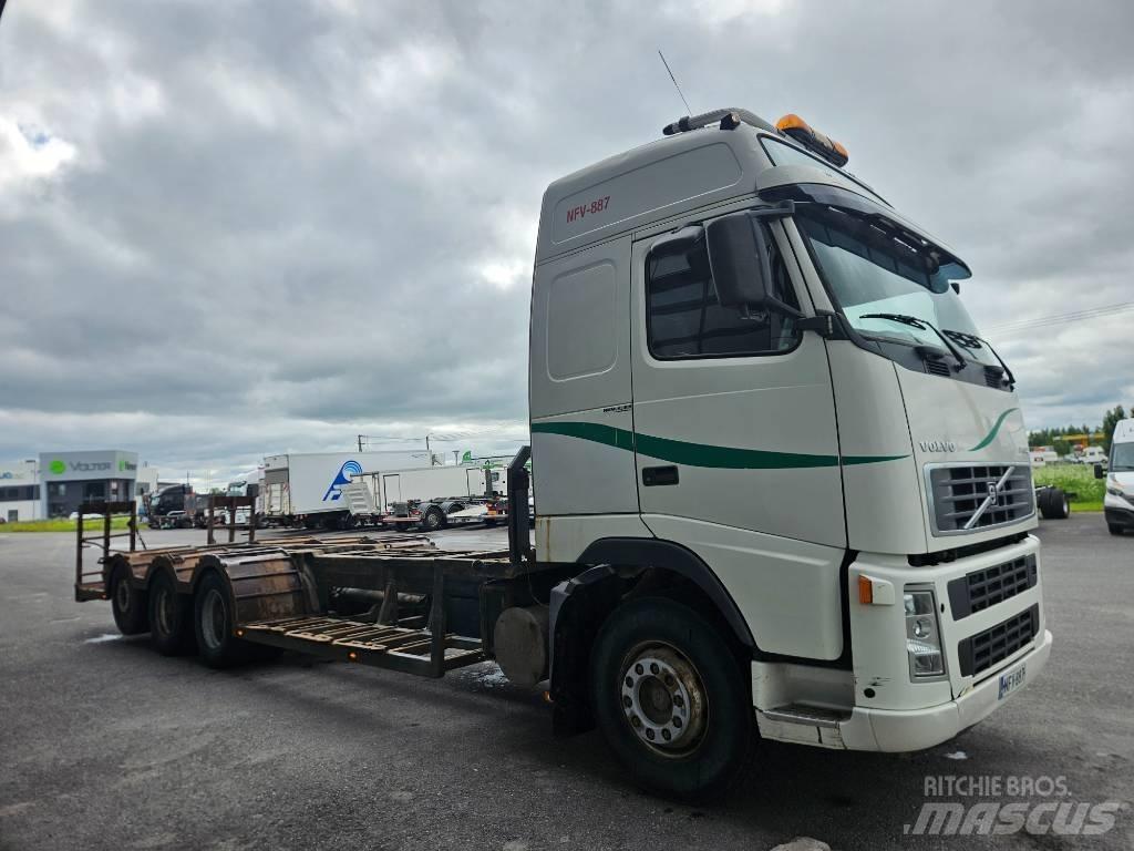 Volvo FH12 8x4 Forest machine transport trucks