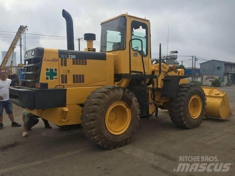 Komatsu WA 320 Backhoe Loaders