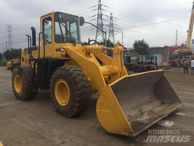 Komatsu WA 320 Backhoe Loaders