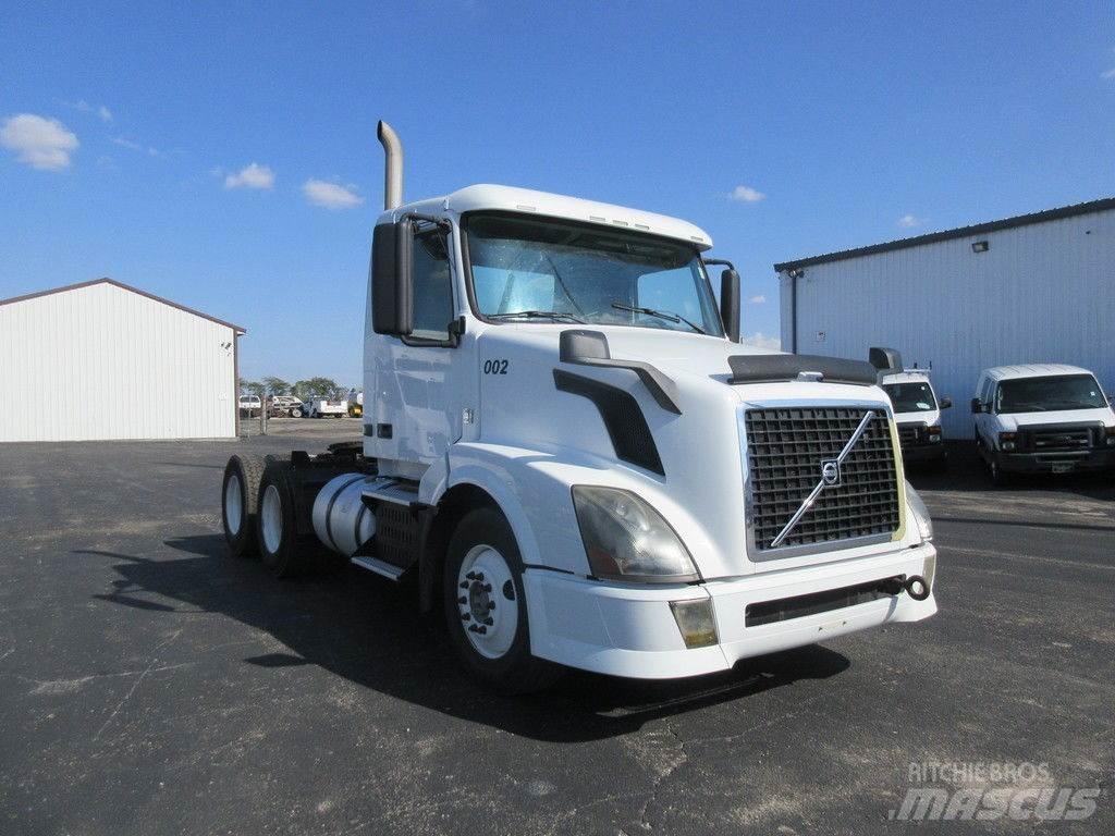Volvo VNL64 Flatbed Trucks