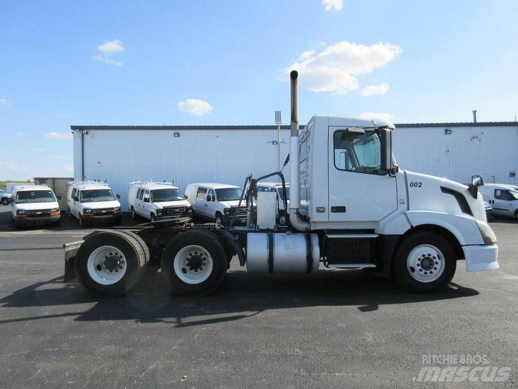 Volvo VNL64 Flatbed Trucks