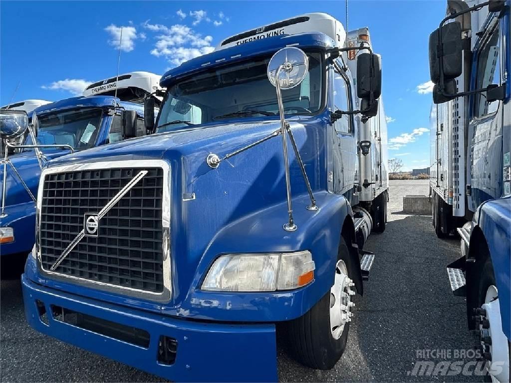 Volvo VNM64T200 Reefer Trucks