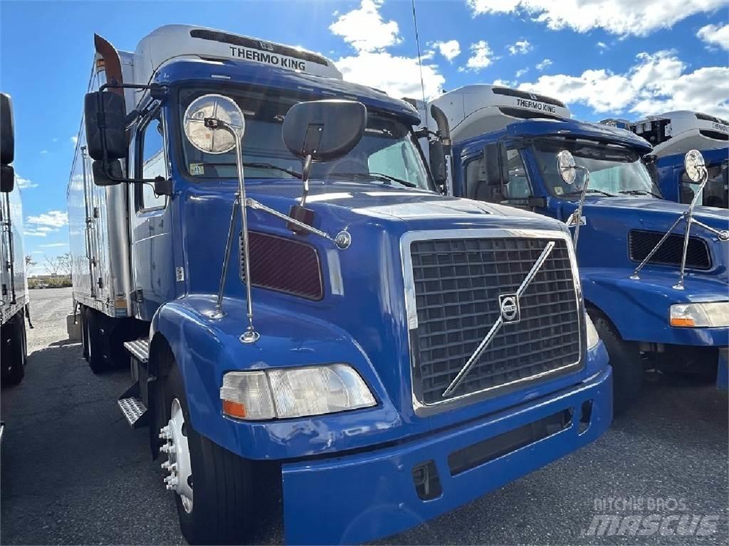 Volvo VNM64T200 Reefer Trucks
