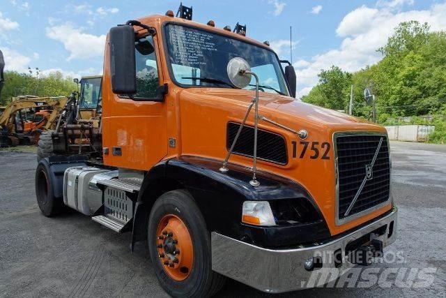 Volvo VNM42T Cab & Chassis Trucks