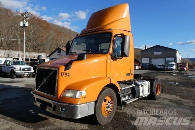 Volvo VNM42T Cab & Chassis Trucks