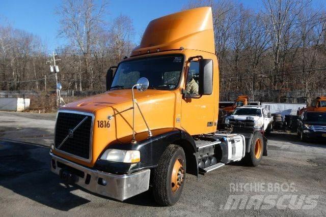 Volvo VNM42T Cab & Chassis Trucks