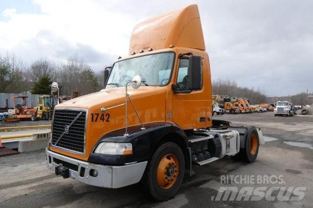 Volvo VNM42T Cab & Chassis Trucks