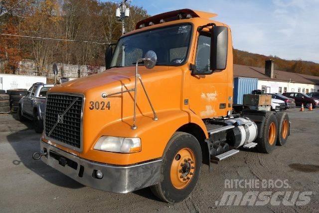 Volvo VNM64T Cab & Chassis Trucks
