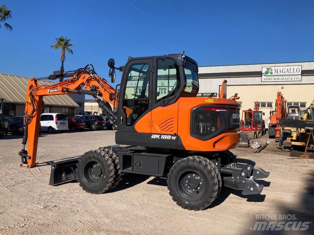 Develon DX 100 W-7 Wheeled Excavators