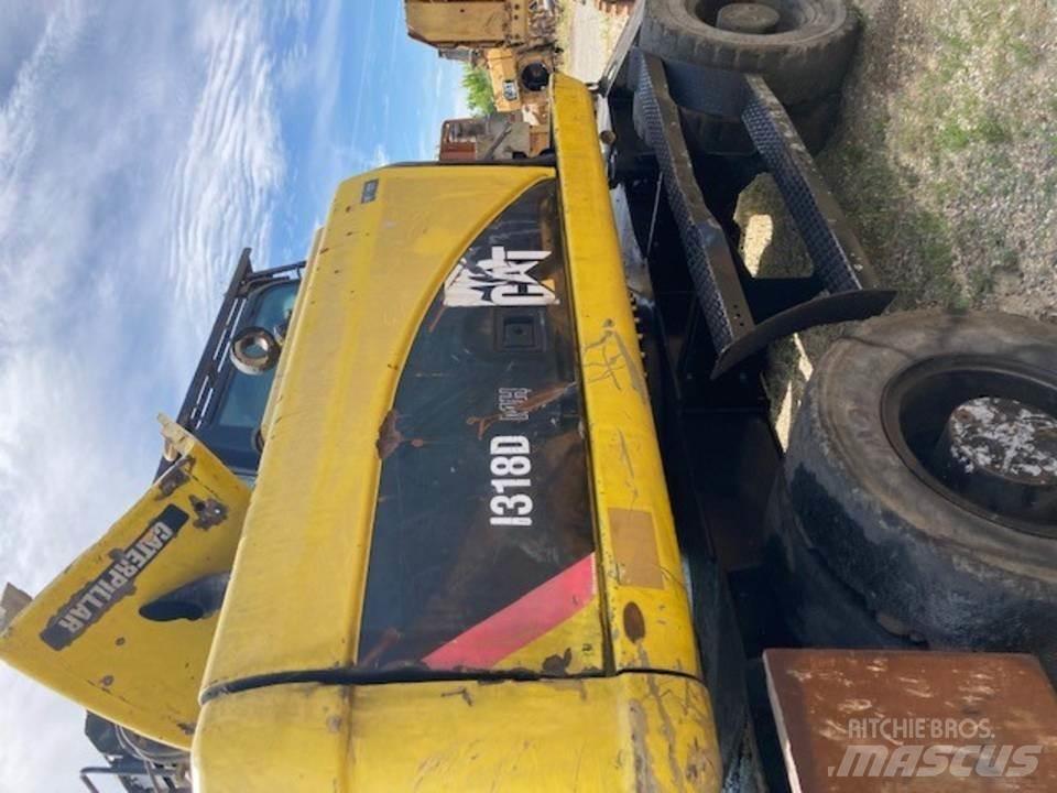 CAT M318D Forestry Cabin