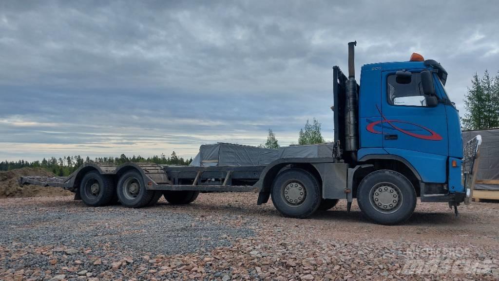 Volvo FH12 8x4 Forest machine transport trucks