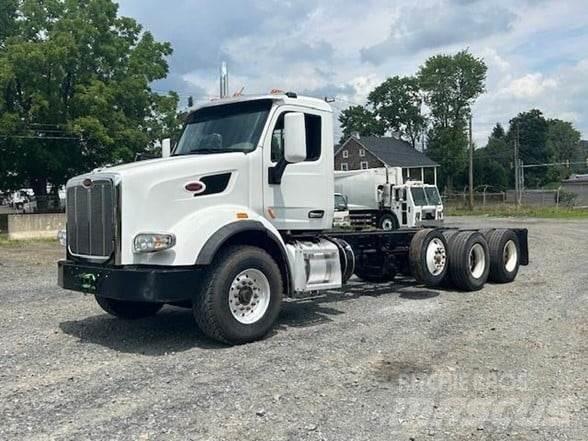 Peterbilt 567 Cab & Chassis Trucks