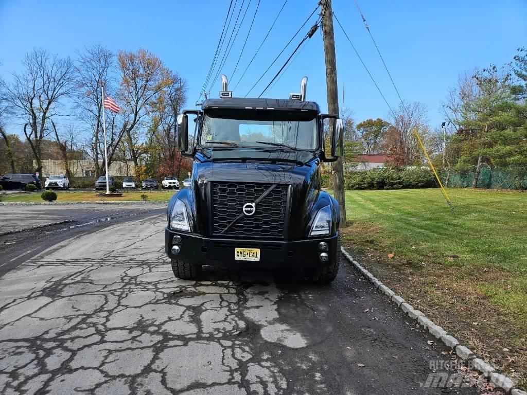 Volvo VNX 64 T300 Flatbed Trucks