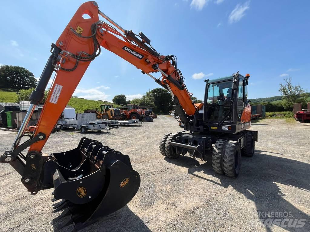 Develon DX 100 W-7 Wheeled Excavators