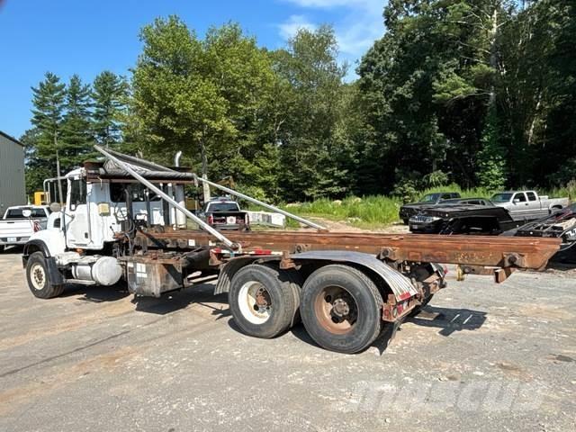 Mack CV713 Skip loader trucks