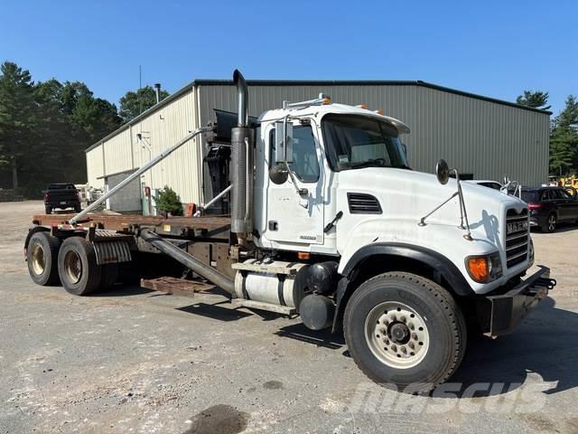 Mack CV713 Skip loader trucks