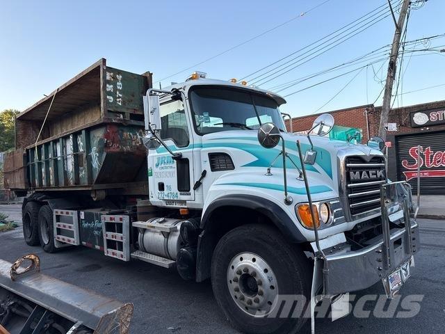 Mack CV713 Skip loader trucks