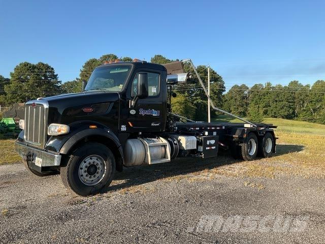 Peterbilt 567 Skip loader trucks
