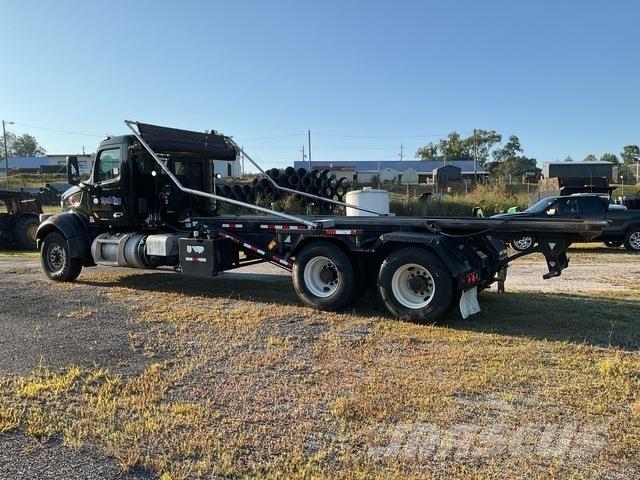 Peterbilt 567 Skip loader trucks