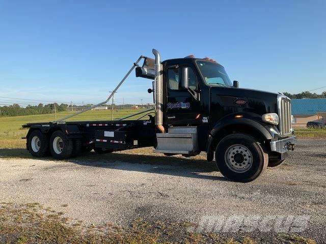 Peterbilt 567 Skip loader trucks