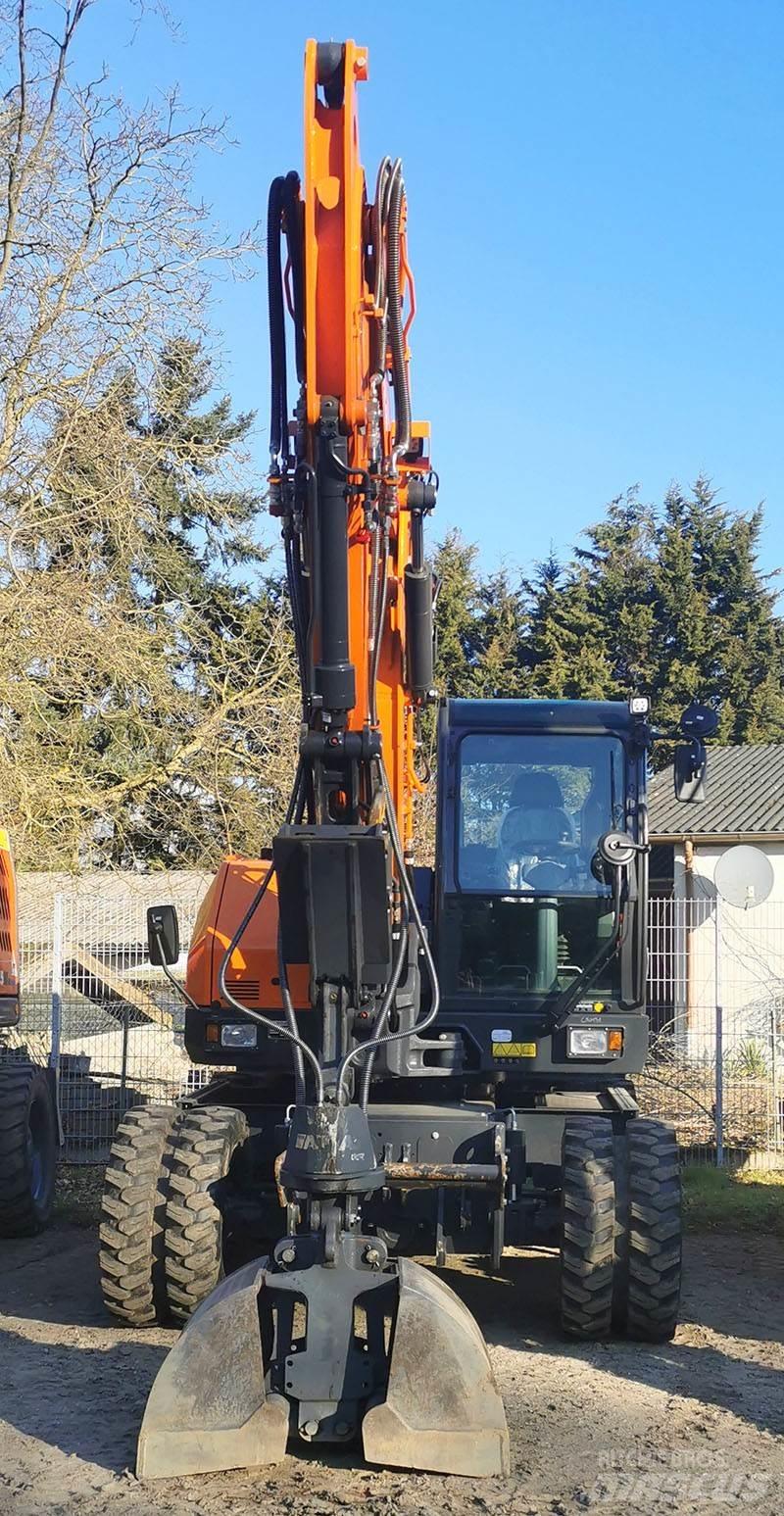 Develon DX 100 W-7 Wheeled Excavators
