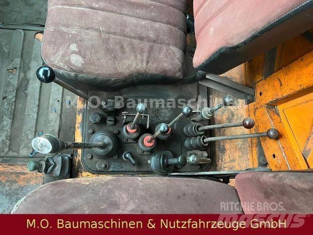 Unimog U 1000/ 424 Dump Trucks