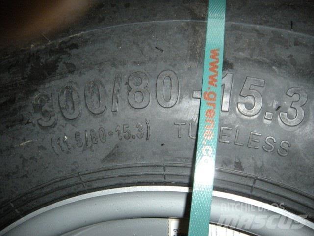 - - - 300-80-15.3 Tires, wheels and rims