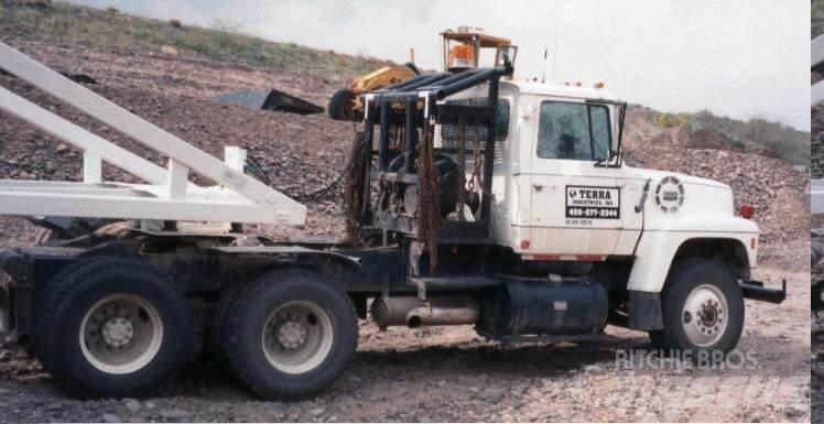 Ford LT9000 Winch trucks