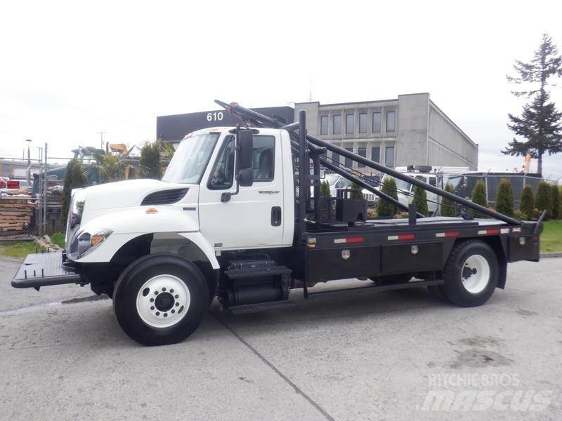 International 7300 Flatbed Trucks