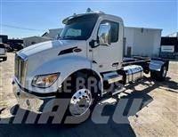 Peterbilt 537 Cab & Chassis Trucks