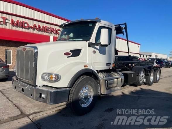 Peterbilt 567 Cab & Chassis Trucks
