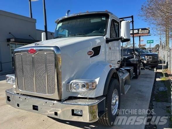 Peterbilt 567 Cab & Chassis Trucks